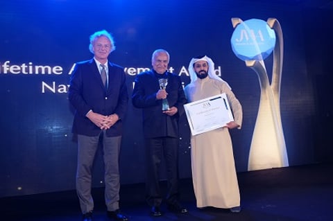 Navrattan Kothari, Chairman KGK Group being presented with the Lifetime Achievement Award by Ahmed Sultan Bin Sulayem, Chief Executive Chairman of DMCC