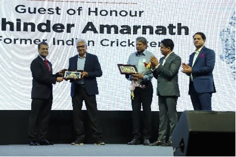 Cricketing legends Mohinder Amarnath and Kapil Dev being felicitated by Colin Shah, Chairman GJEPC 